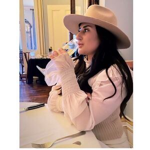 Ruffle cream sweater top